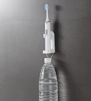 Držiak na elektrickú zubnú kefku