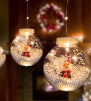 LED svetelný záves - snehová guľa s mikulášom - 2,7 x 0,75 m - 110 teplých bielych LED - IP44